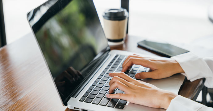 Laptop Typing on a laptop.