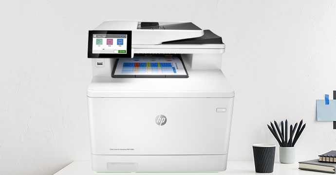 HP Color LaserJet Enterprise MFP M480f HP Color LaserJet Enterprise MFP M480f printer on desk