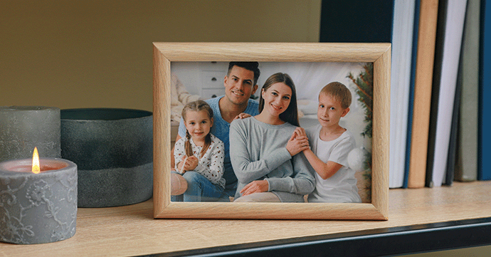 Photo of a family in a frame.