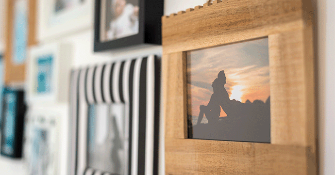 Photos Displayed in a Home Photos displayed in frames in a home.