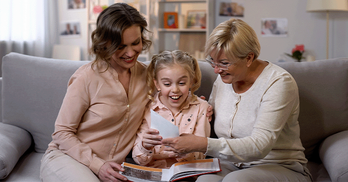 Sharing a printed photo with others.