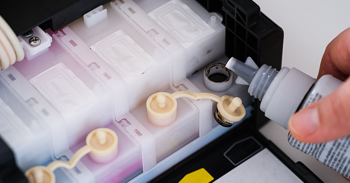 Refilling printer ink