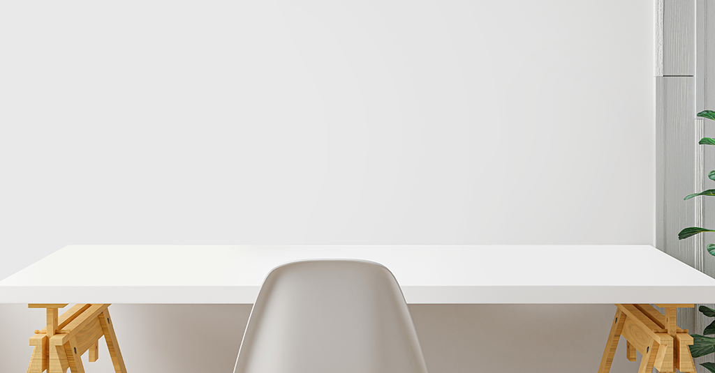 Empty desk with a chair.