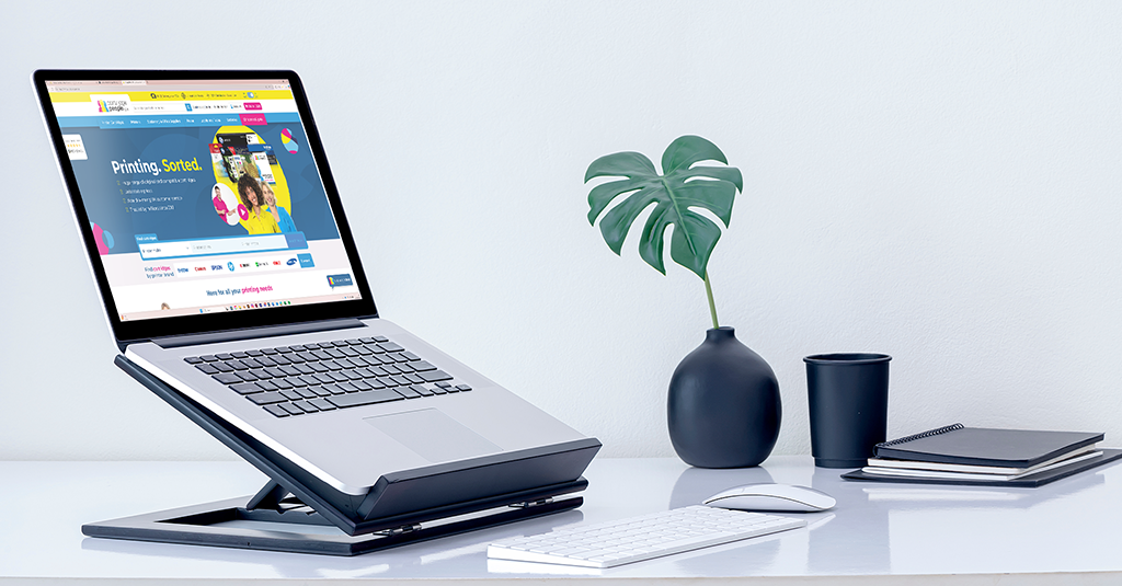 Laptop on a laptop riser.