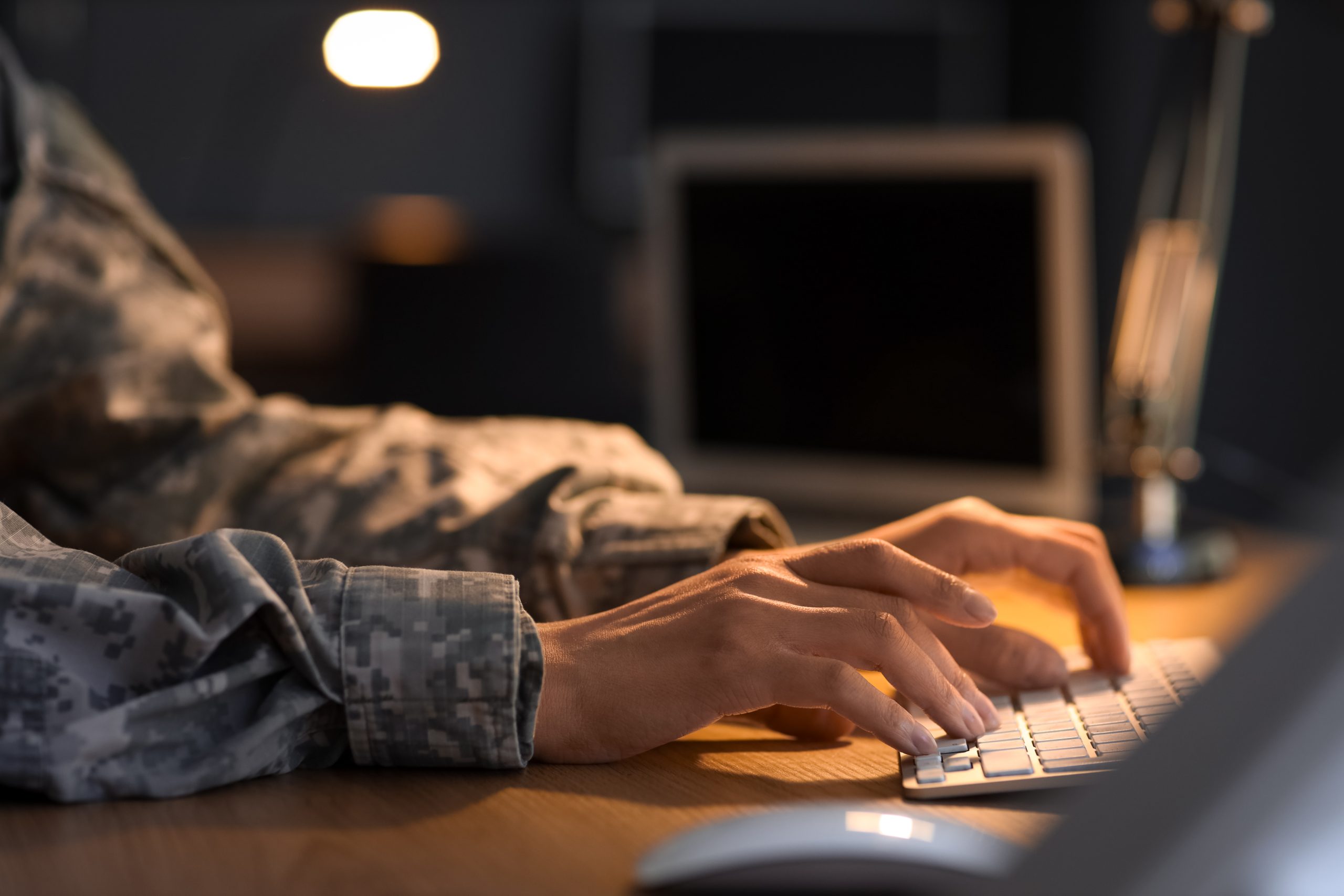 Person working at computer.