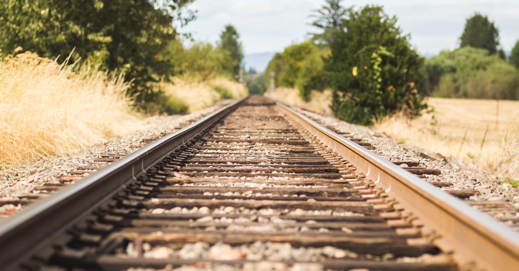 train track leading lines photo example train track leading lines photo example